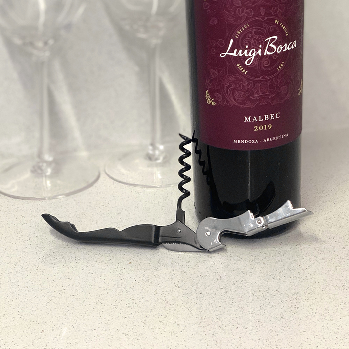 DESTAPADOR SACACORCHOS "UCO" NEGRO